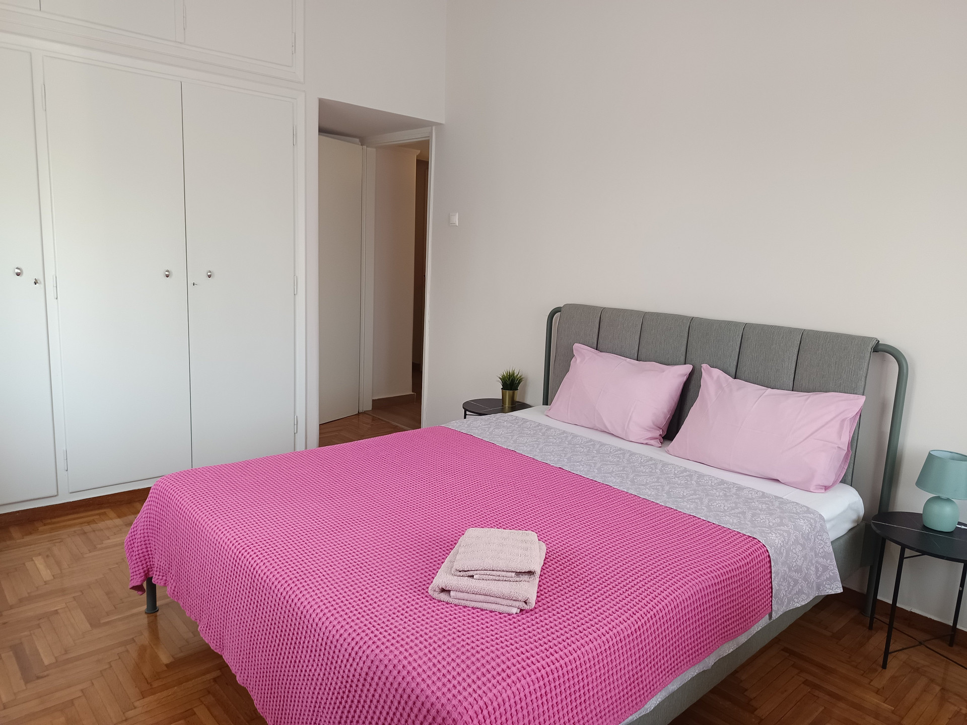 Bedroom with wardrobe and bed