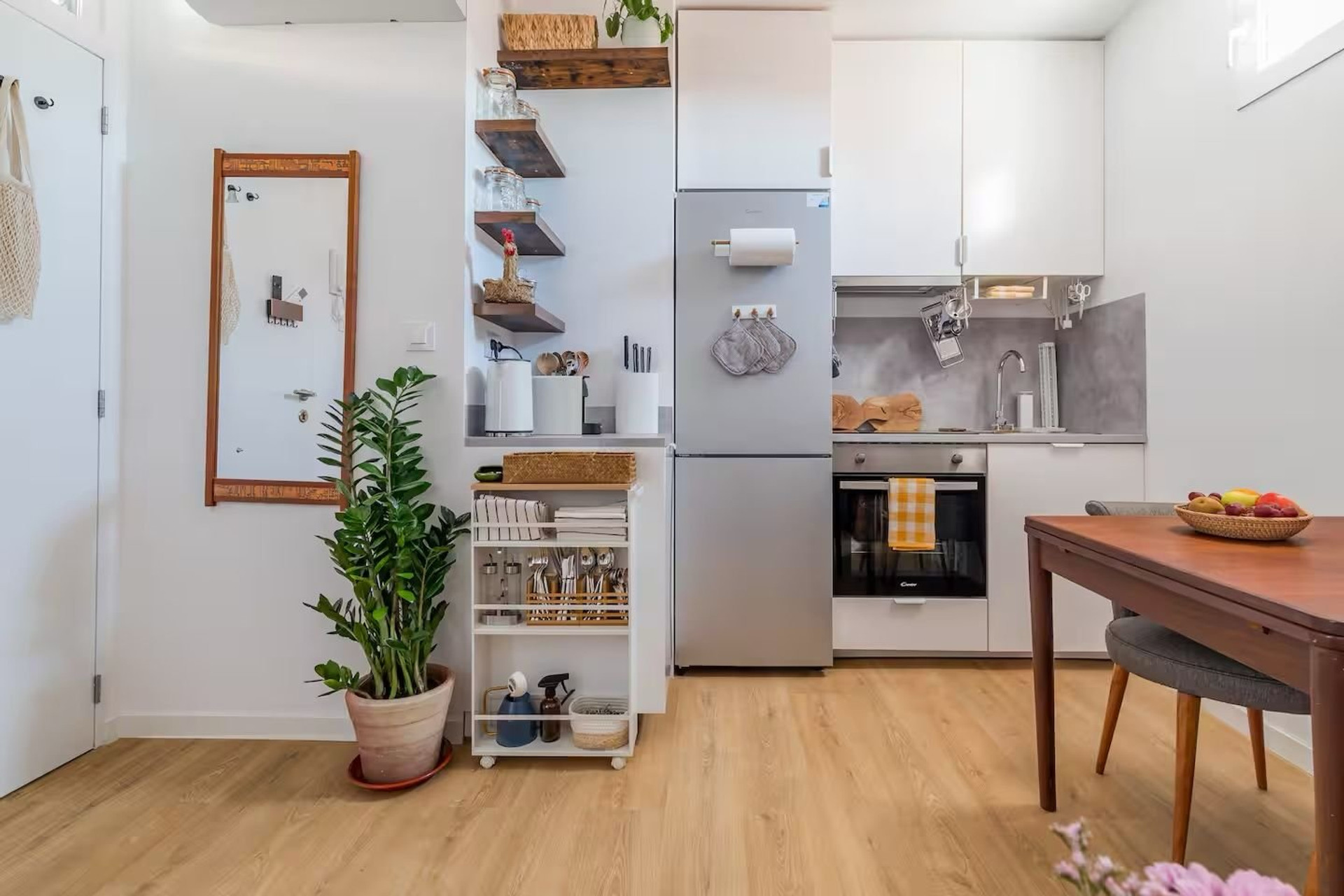 White kitchen with wood shelves