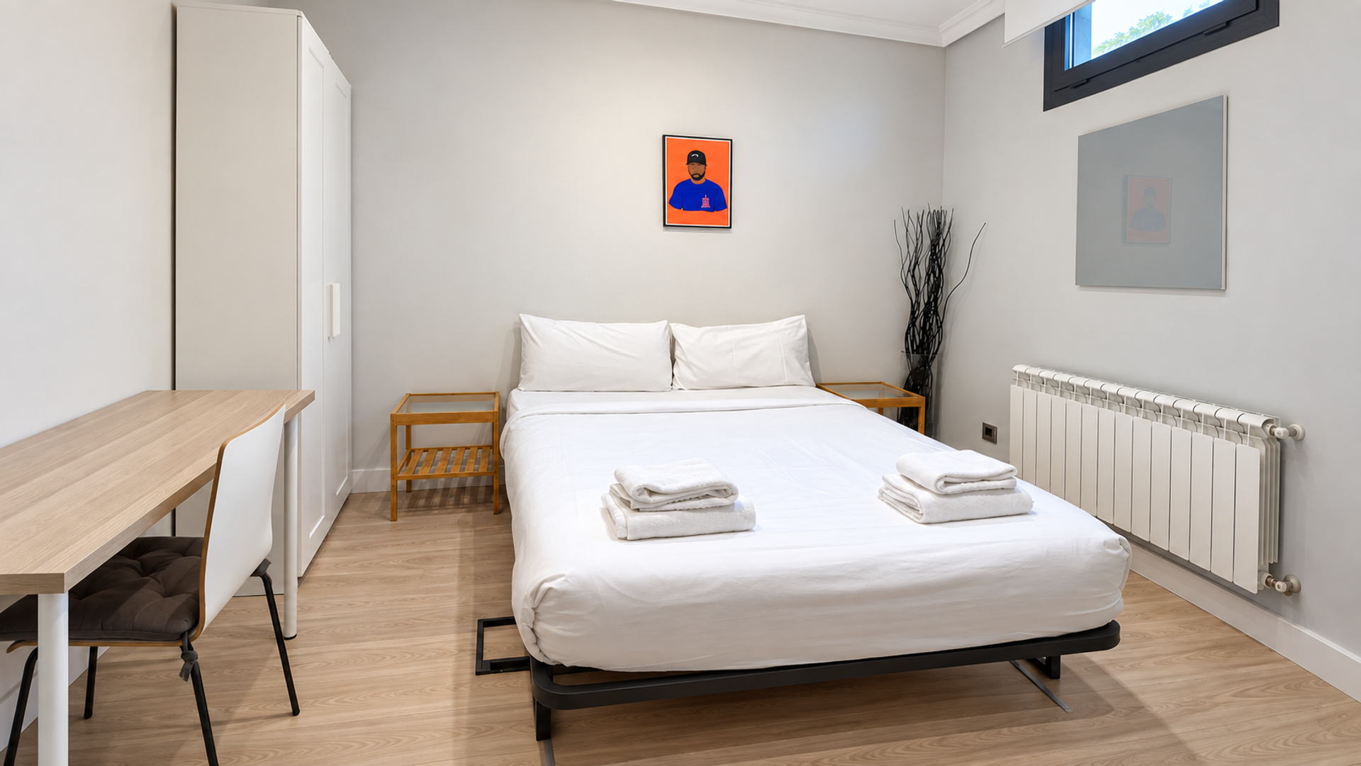 Bright bedroom with double bed