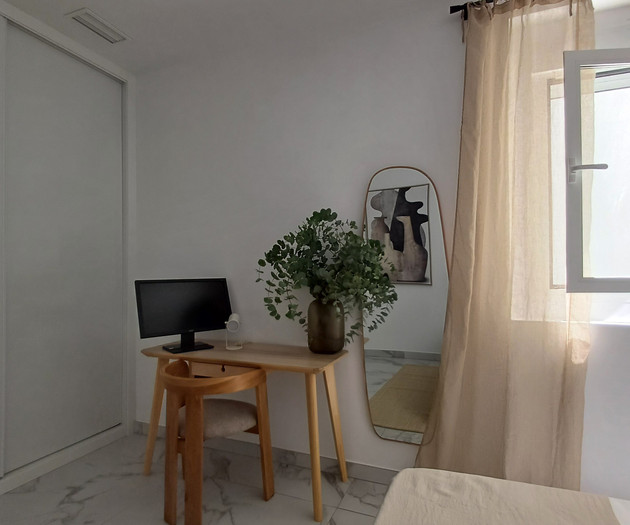 Bedroom corner with desk