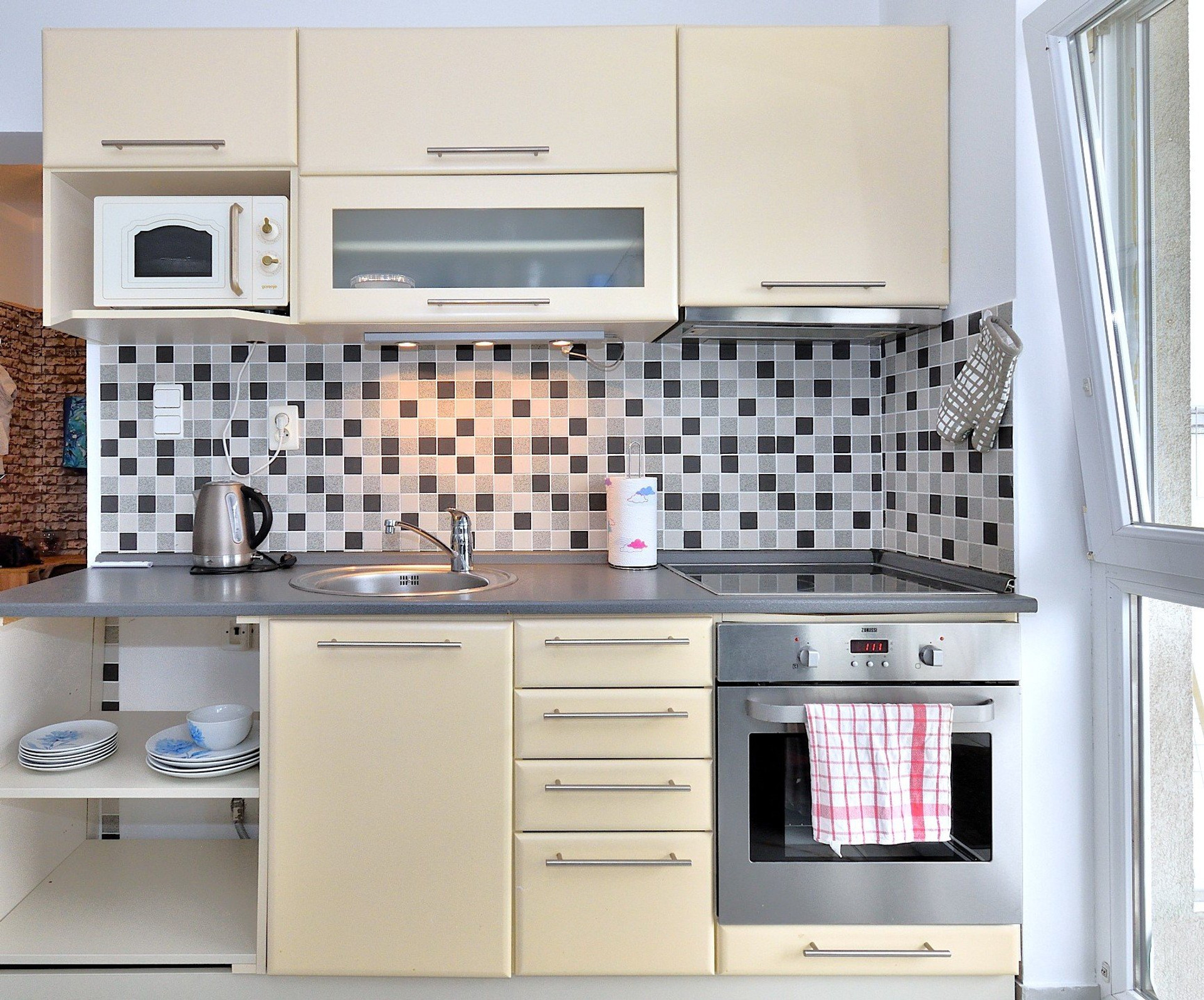 Kitchen with oven and cabinets