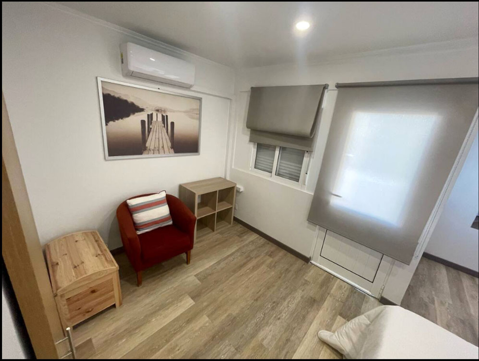 Second bedroom with armchair