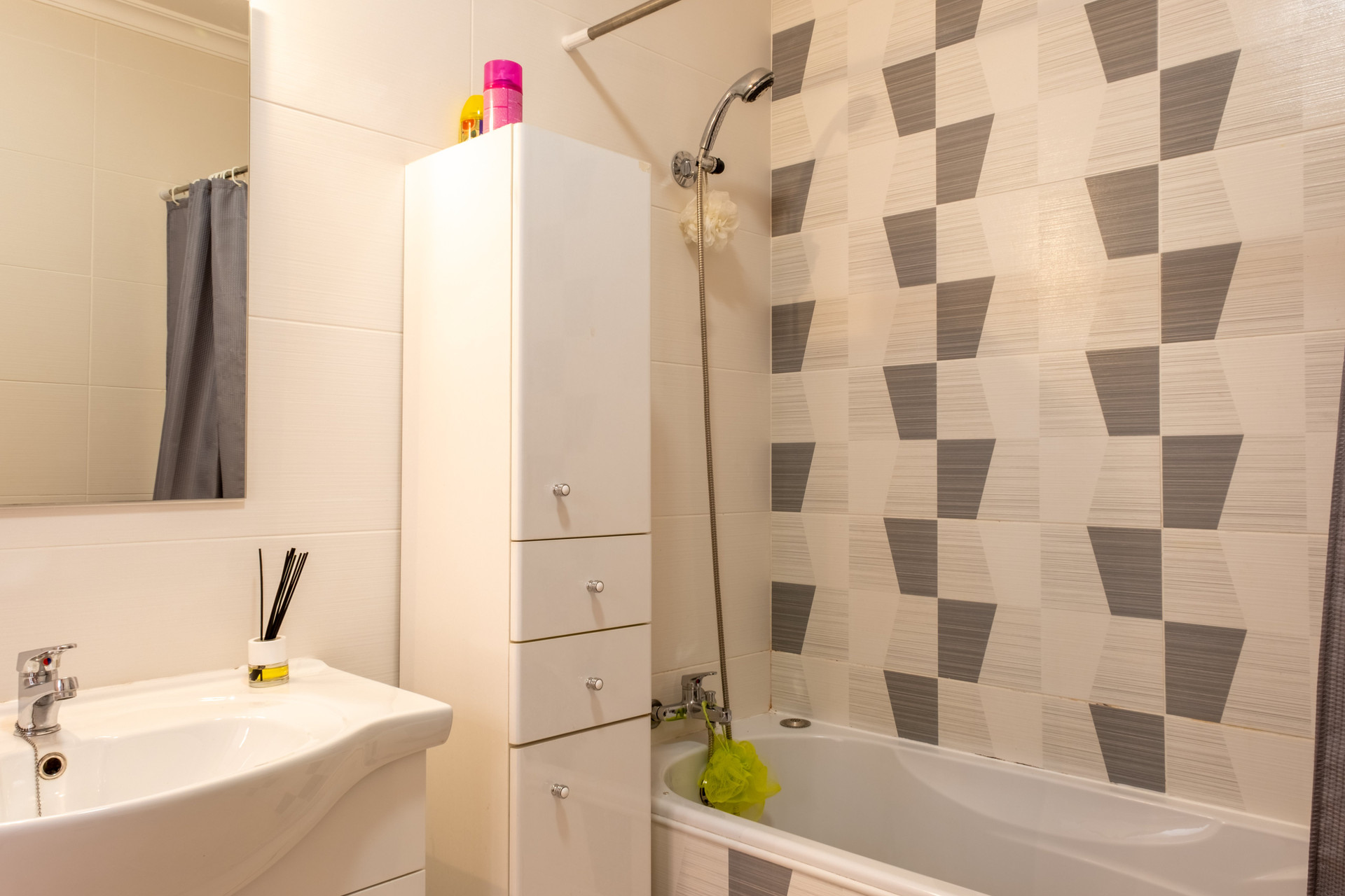 Bathroom with bathtub and shower