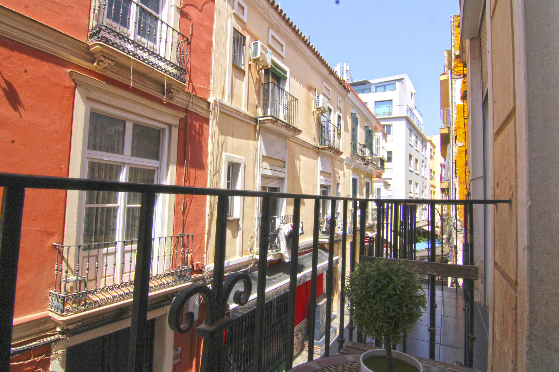 Balcony overlooking neighborhood street