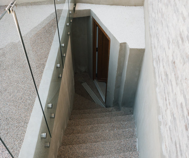 Stairs down to basement entrance