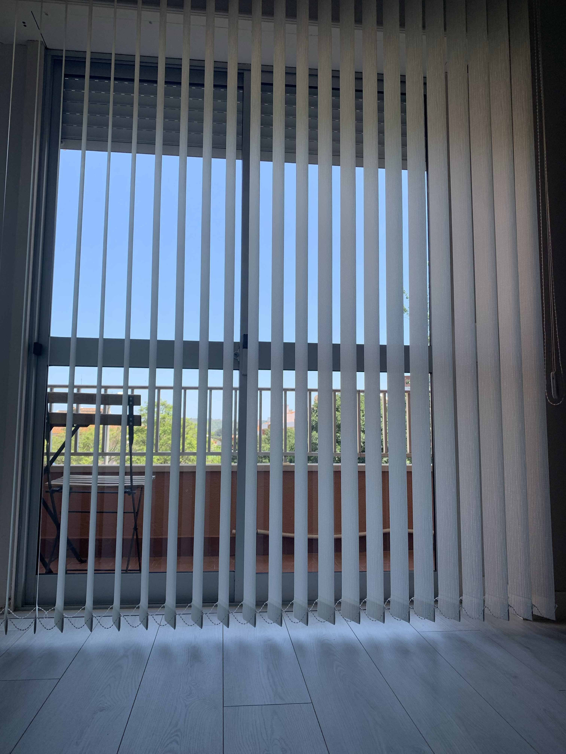 Window view with balcony blinds