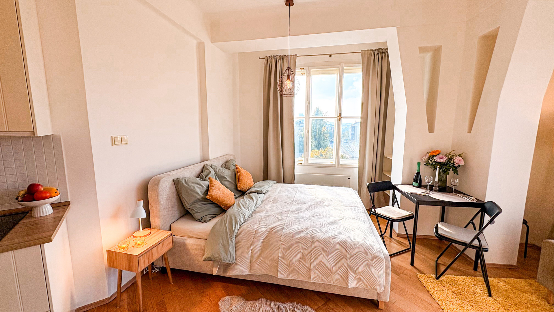 Bed, kitchen and dining table