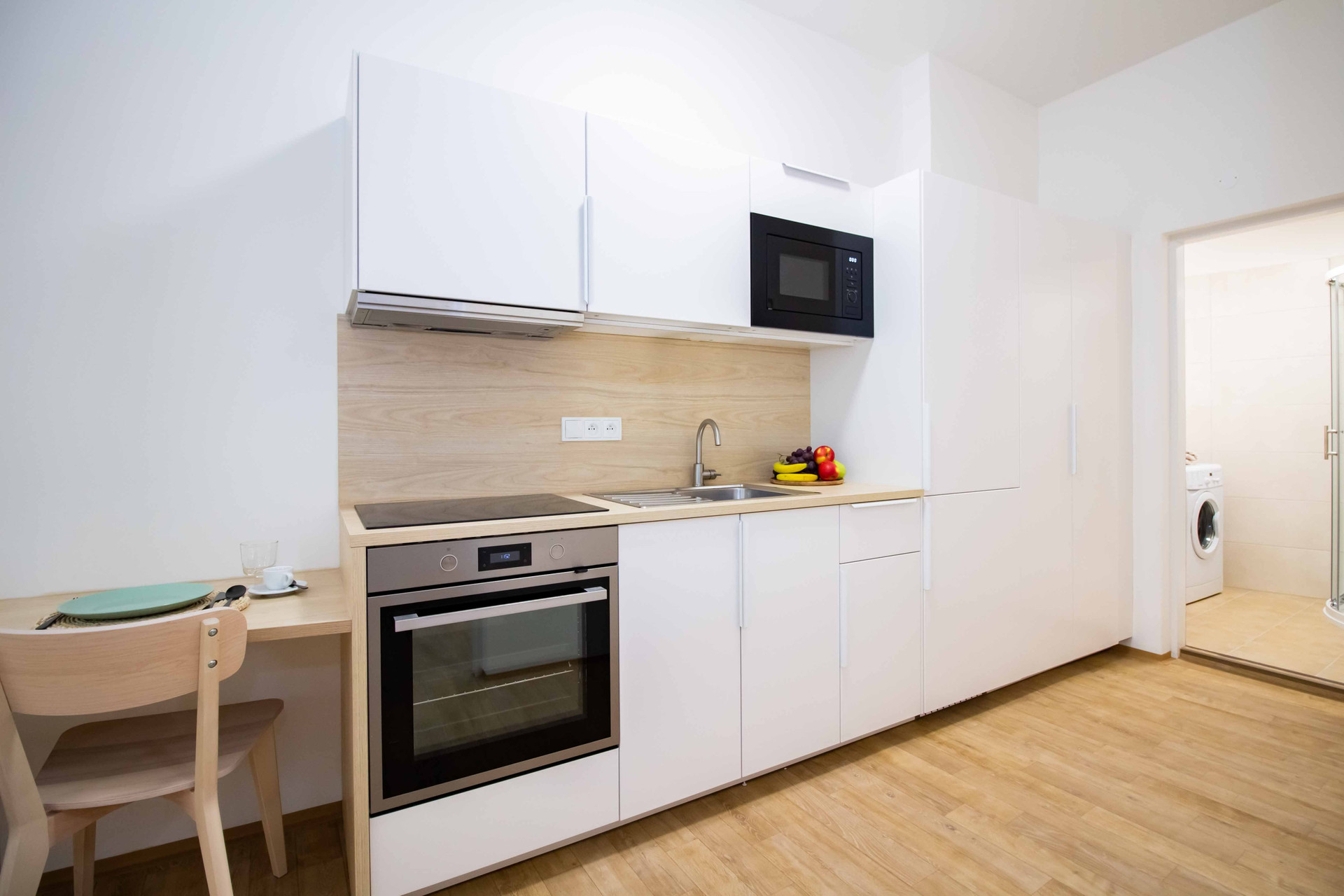 Modern kitchen with oven and microwave