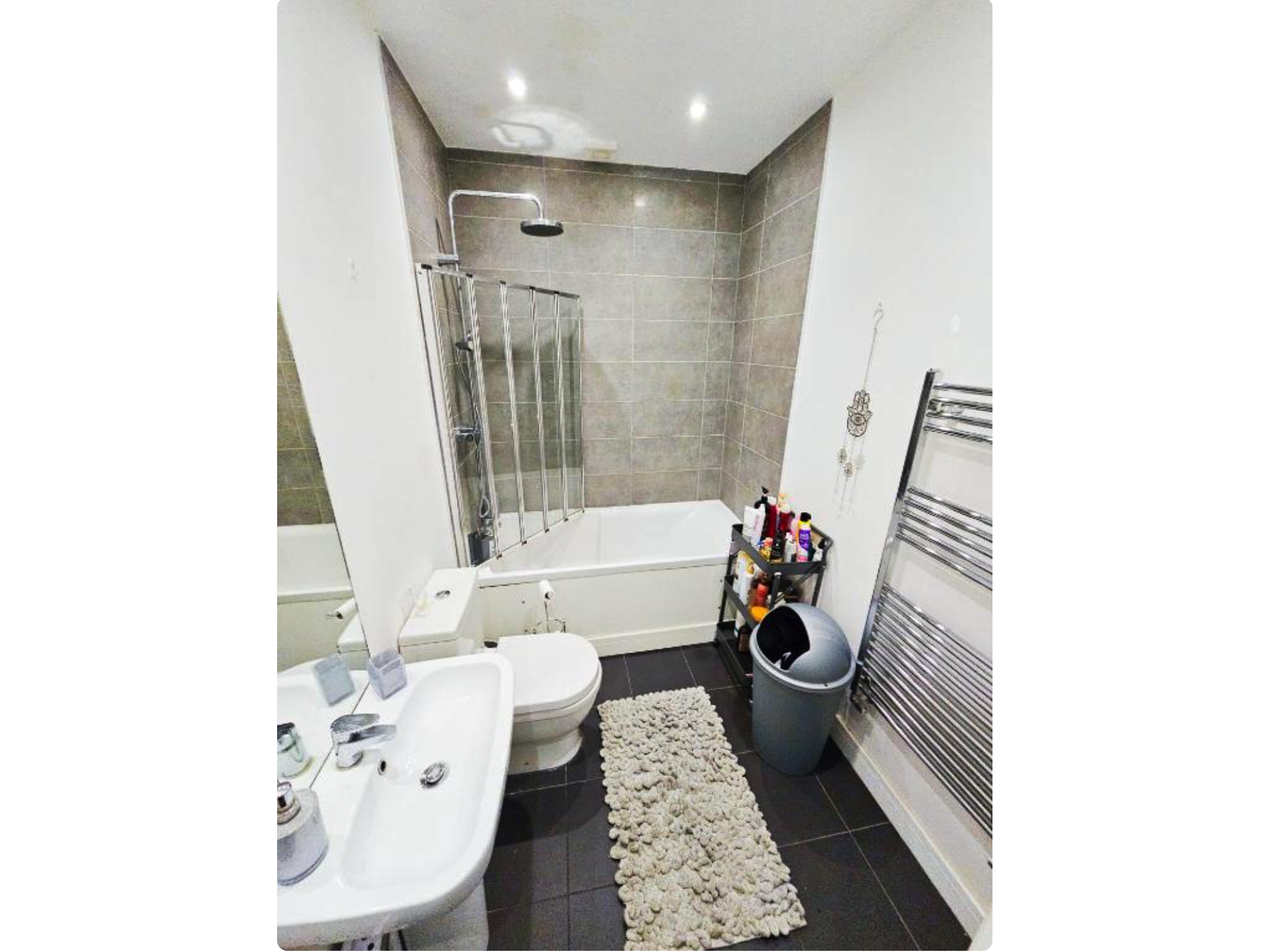 Bathroom with bathtub and shower