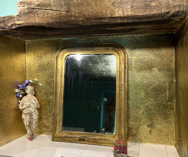 Bathroom gold mirror and sink