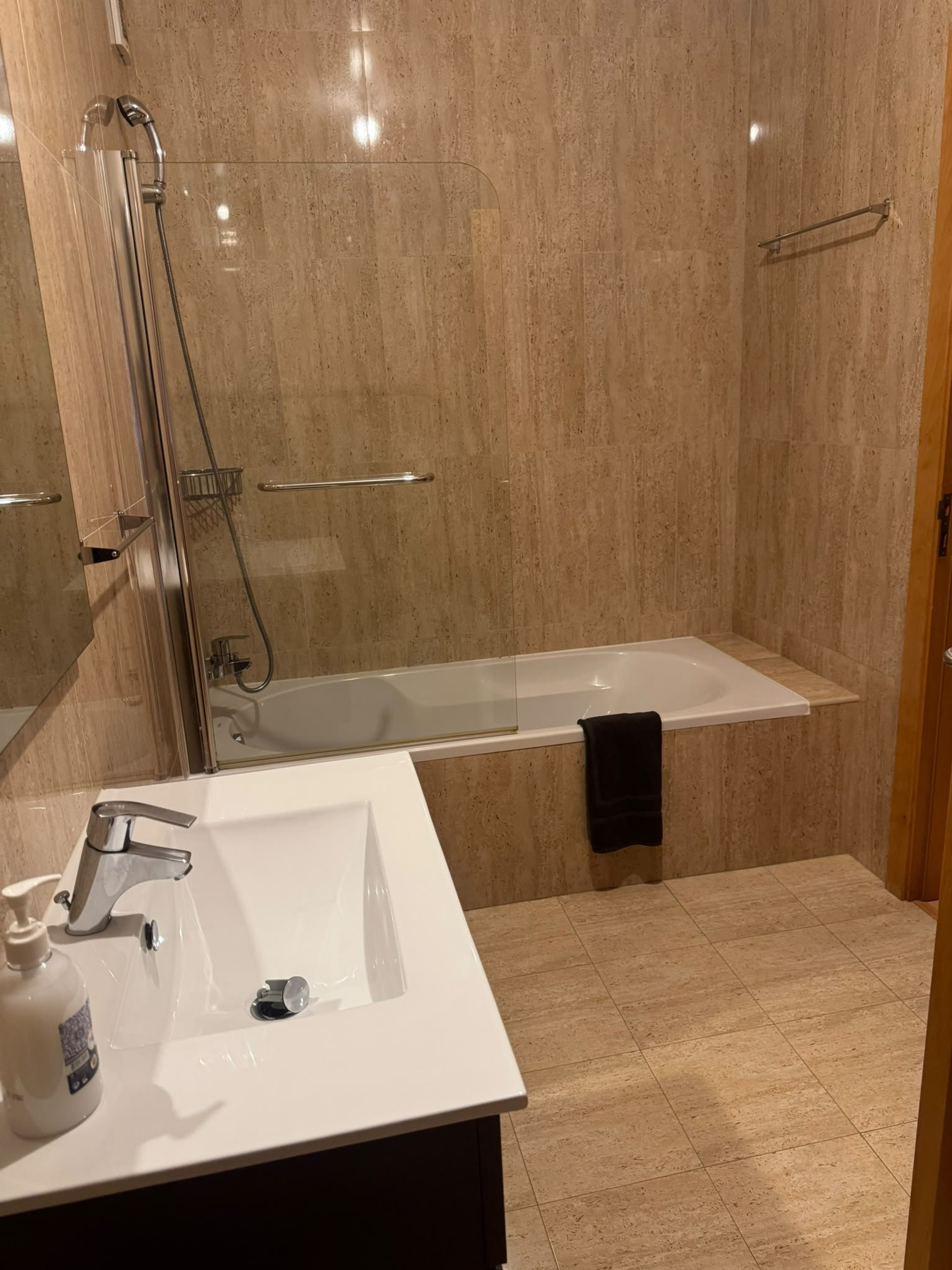 Bathroom with bathtub and sink
