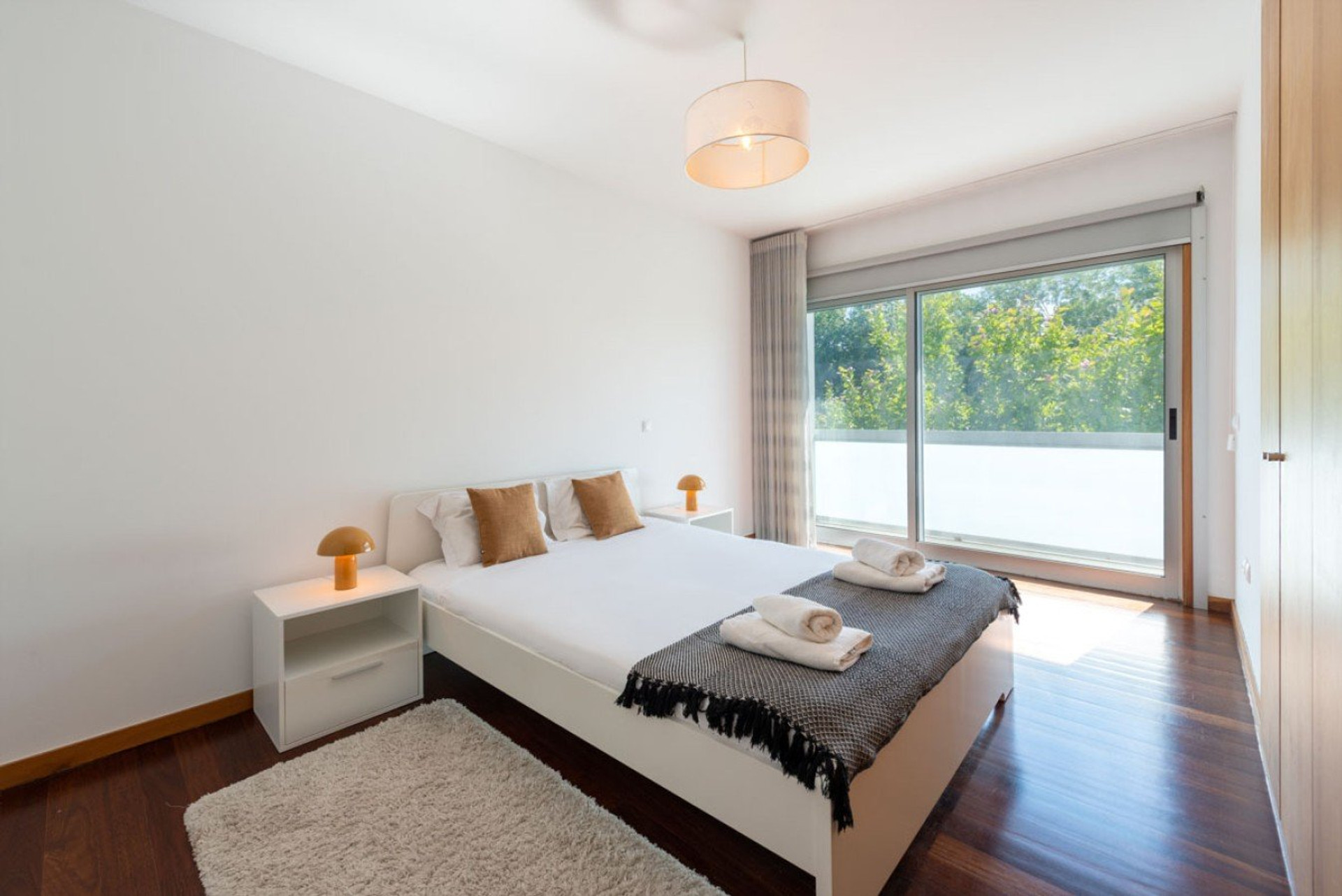 Bedroom with balcony view