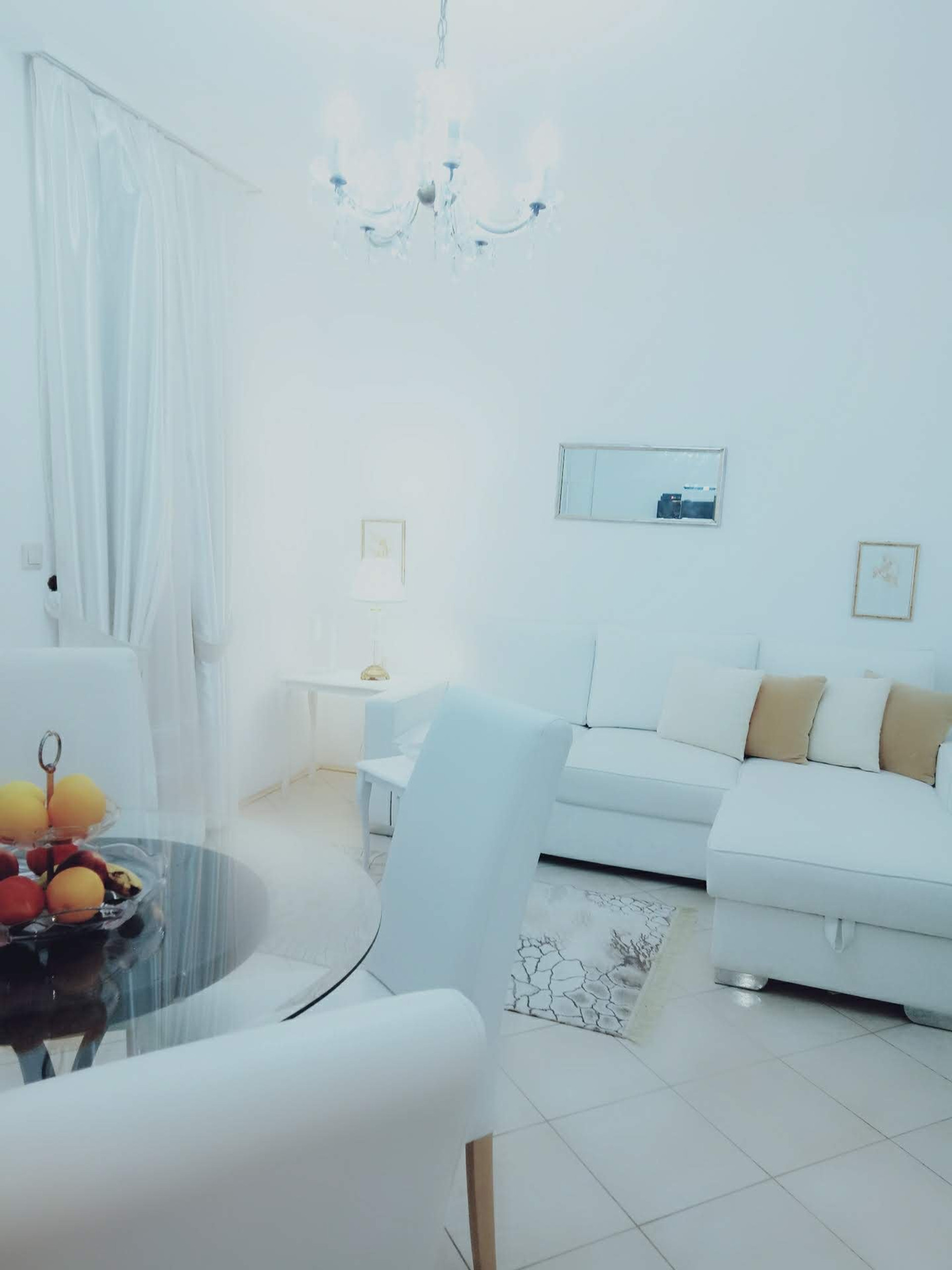 Bright living room with corner sofa
