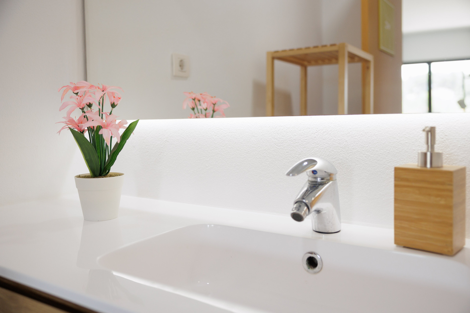 Bathroom sink with pink flowers