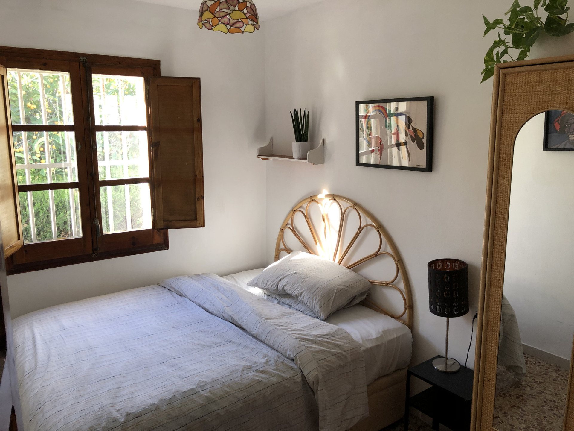 Your private bedroom with black out shutters and mosquito nets