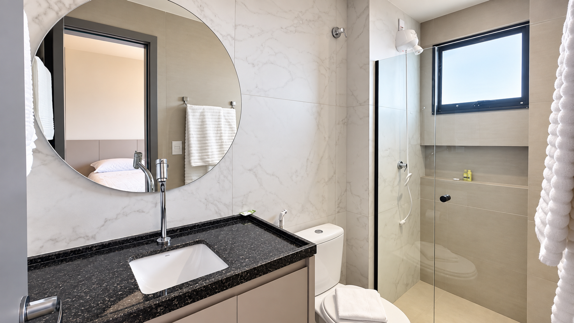 Bathroom with marble vanity