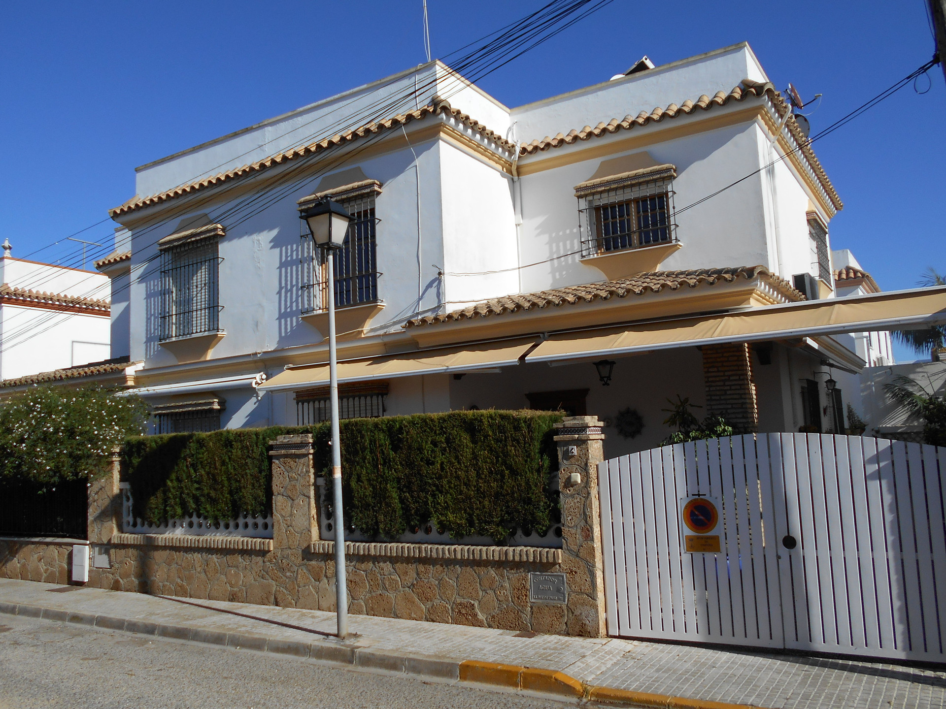 House exterior with gated entrance