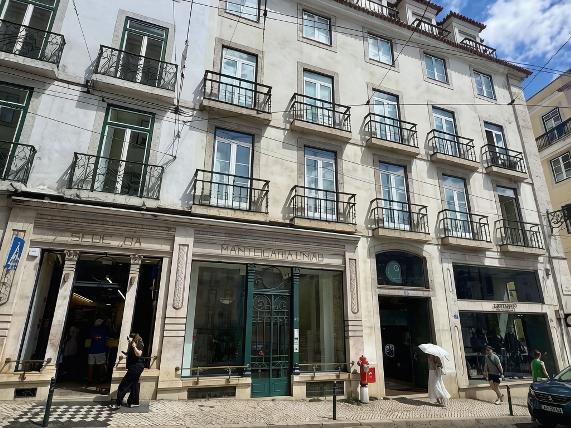 Building facade with shops and balconies