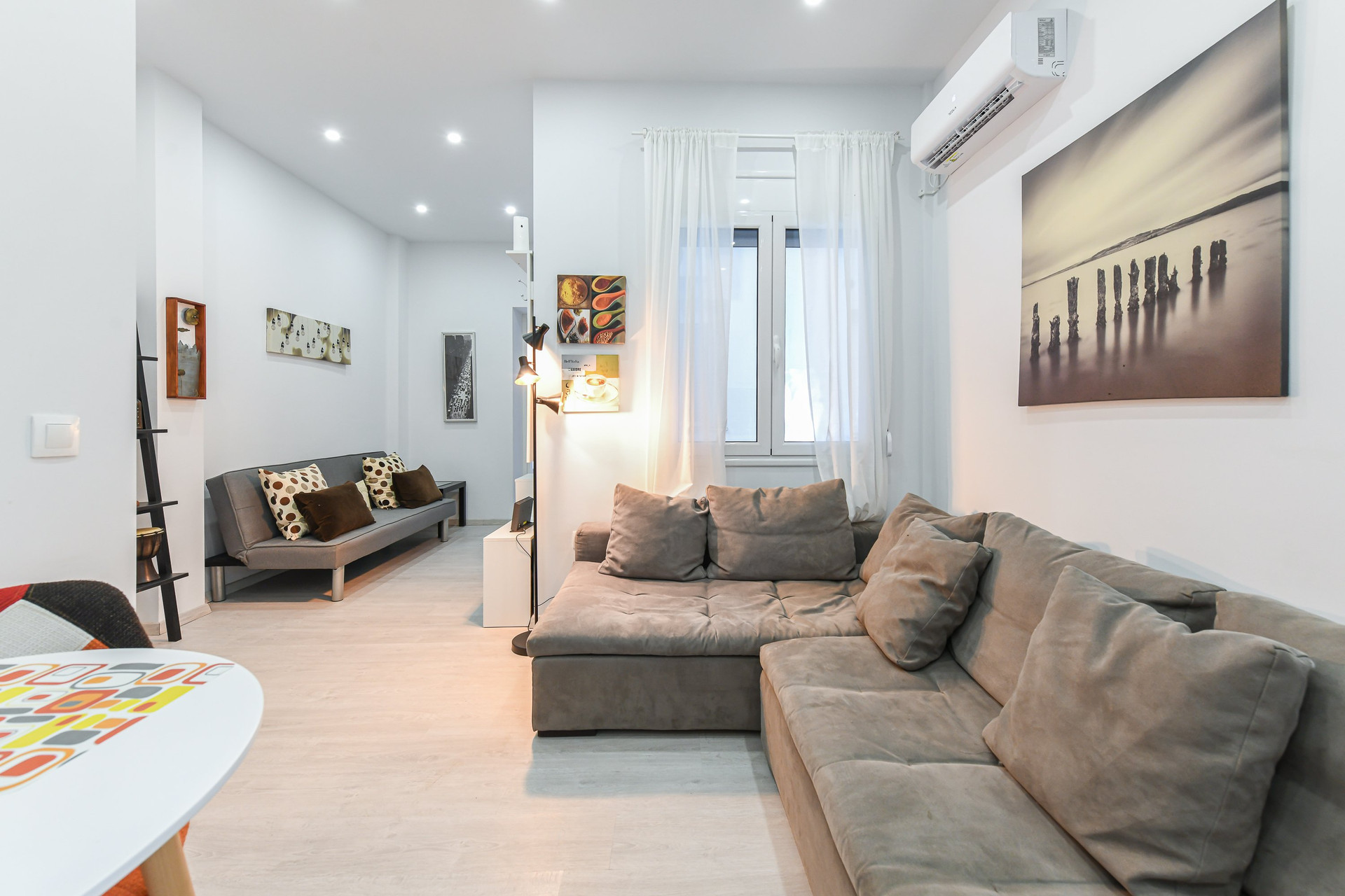Spacious living room with large sofa