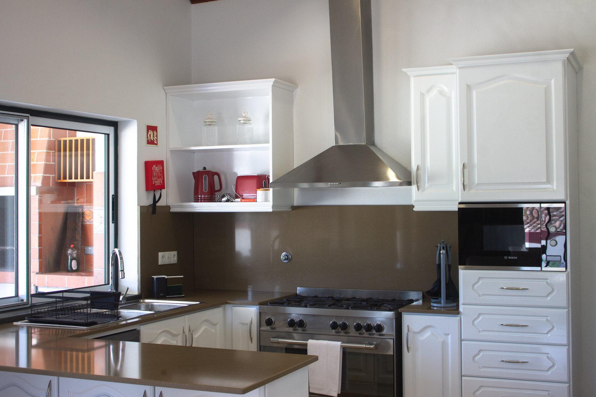 Modern kitchen with white cabinets