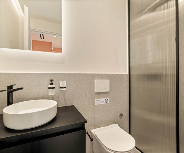 Modern bathroom with black fixtures