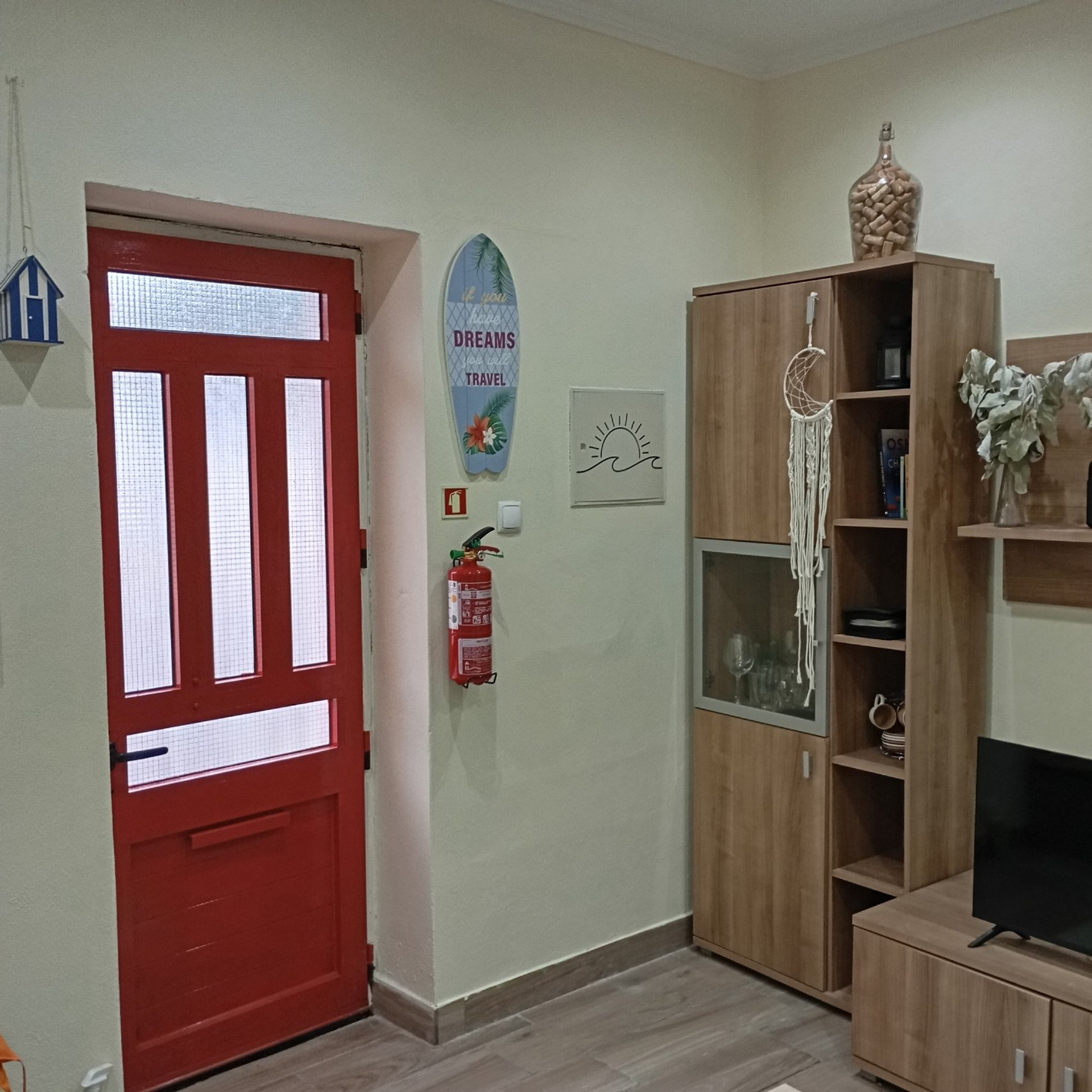 Living room with red door