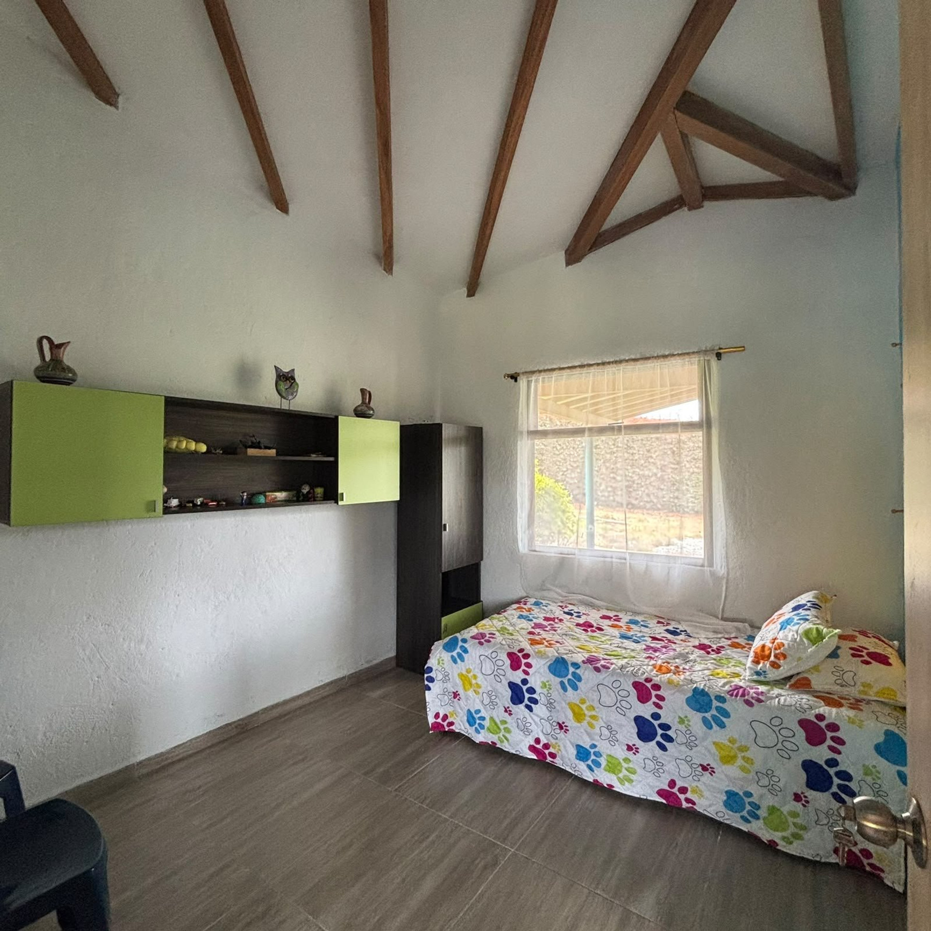 Bedroom with colorful bedding