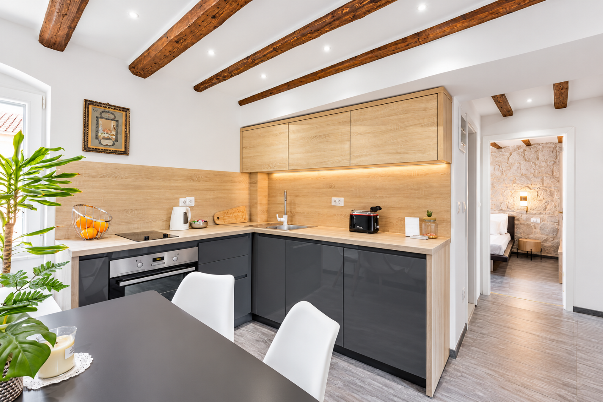 Kitchen with open bedroom view