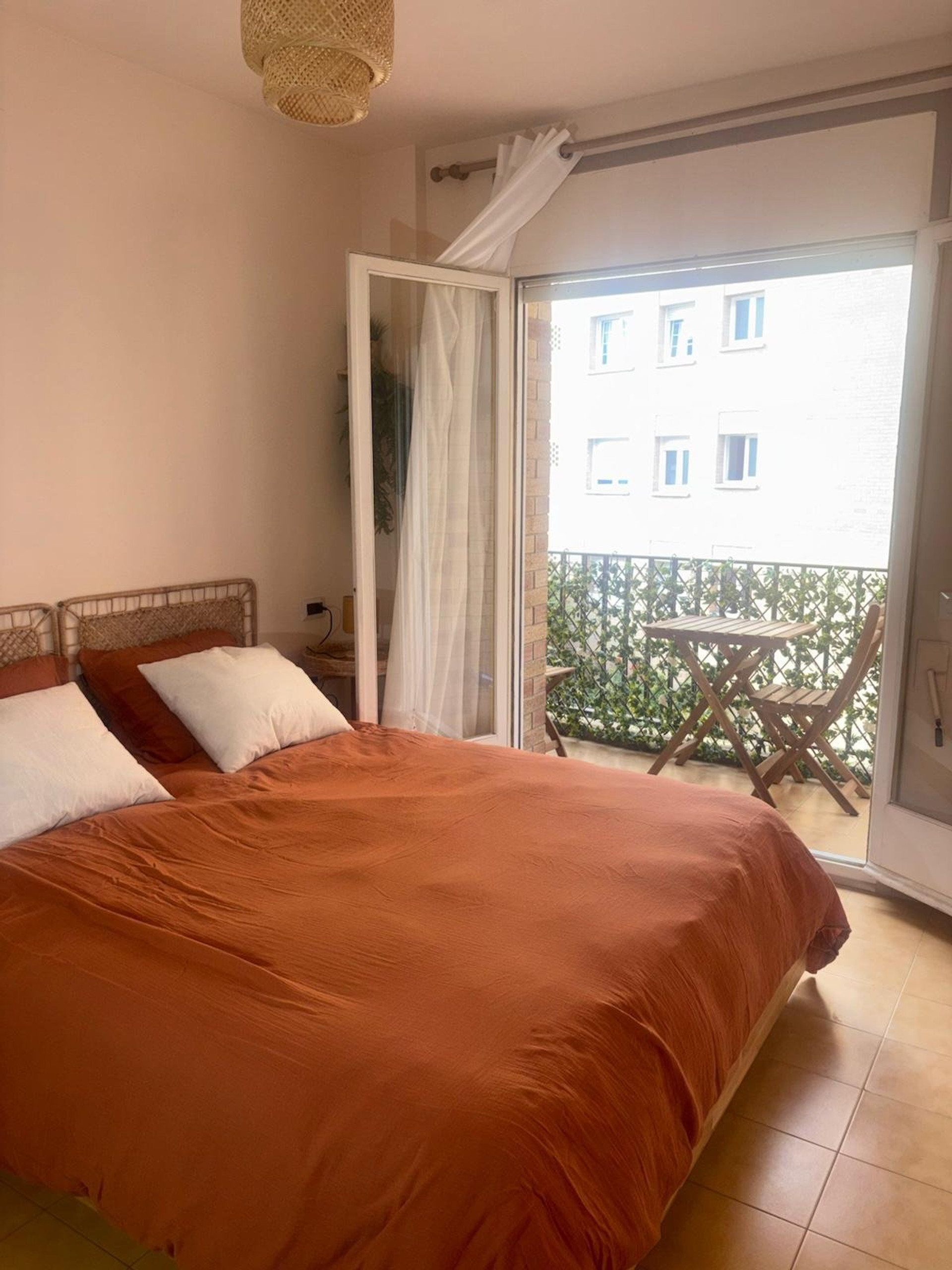 Bedroom with balcony access