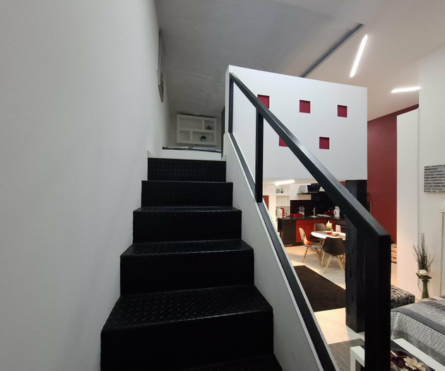 Staircase with living room view