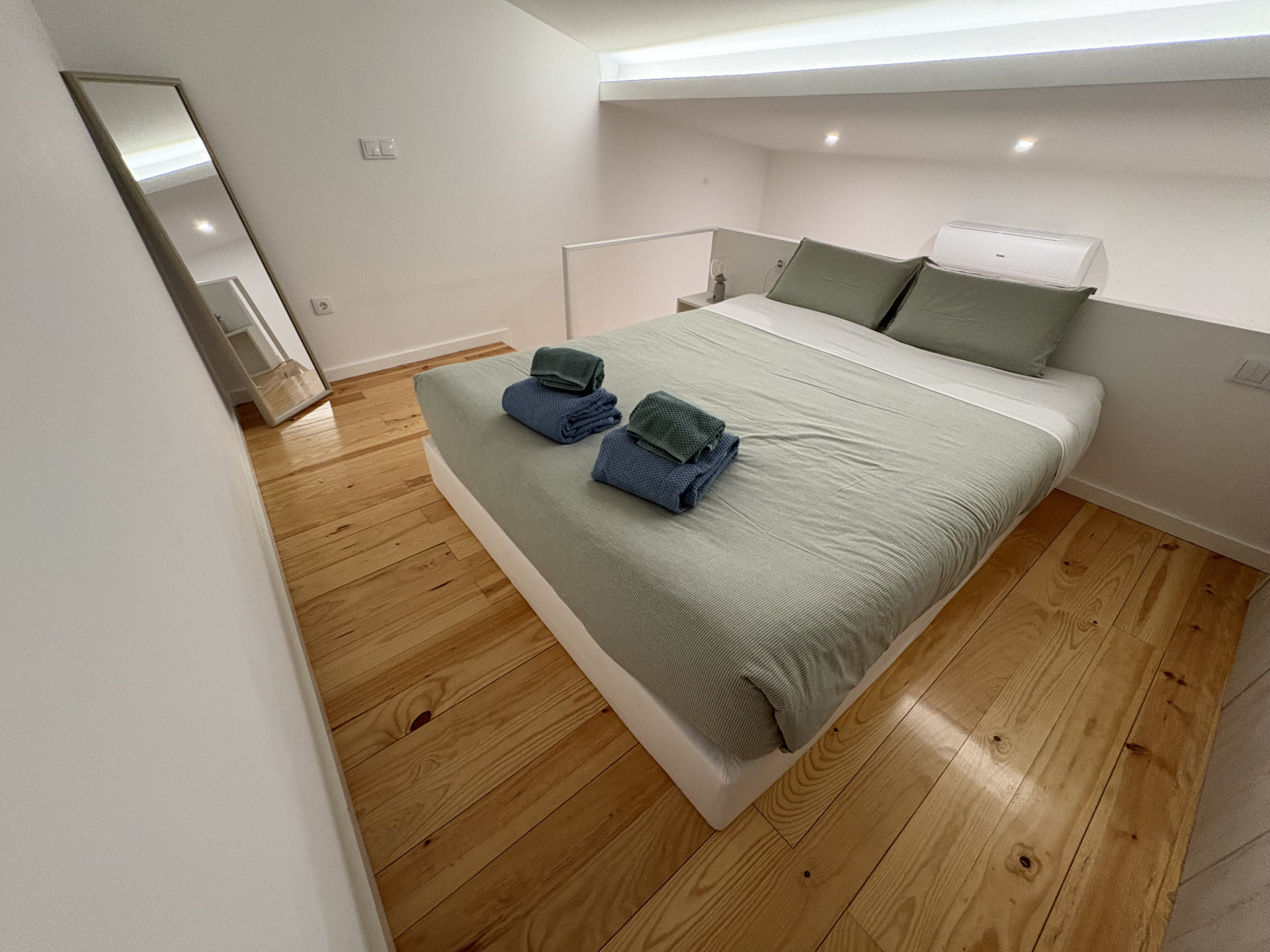 Cozy bedroom with mirror