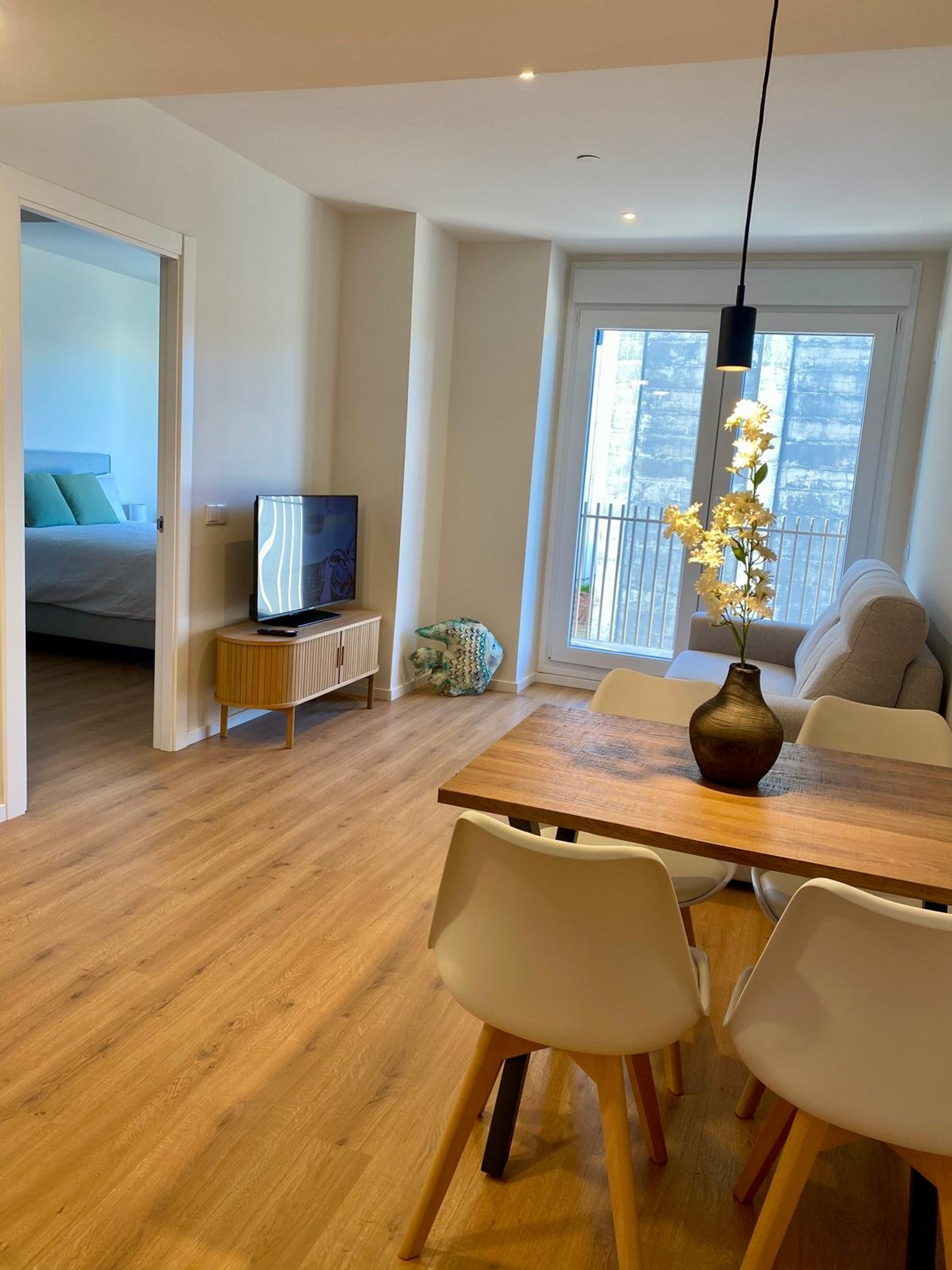 Open living dining area with TV