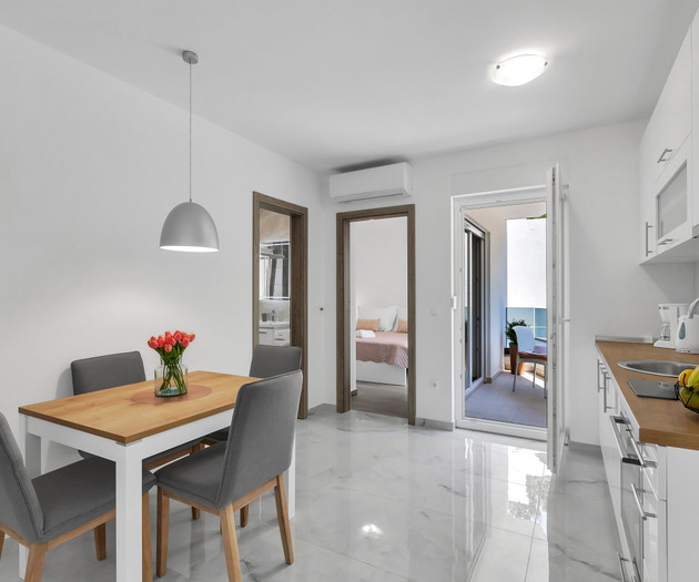 Dining area with kitchen view