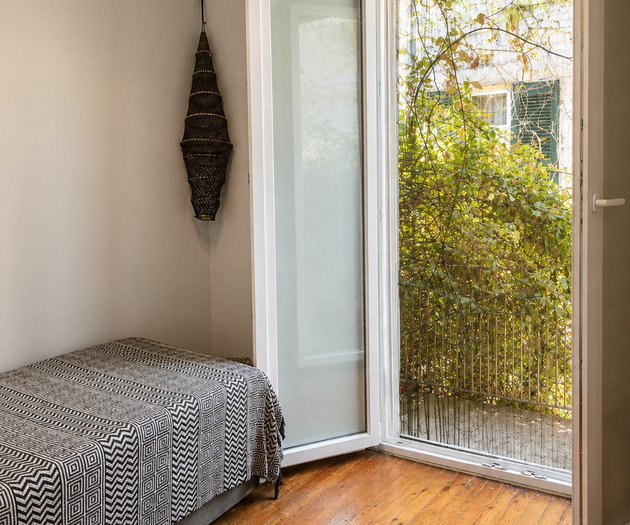 Bedroom with balcony access