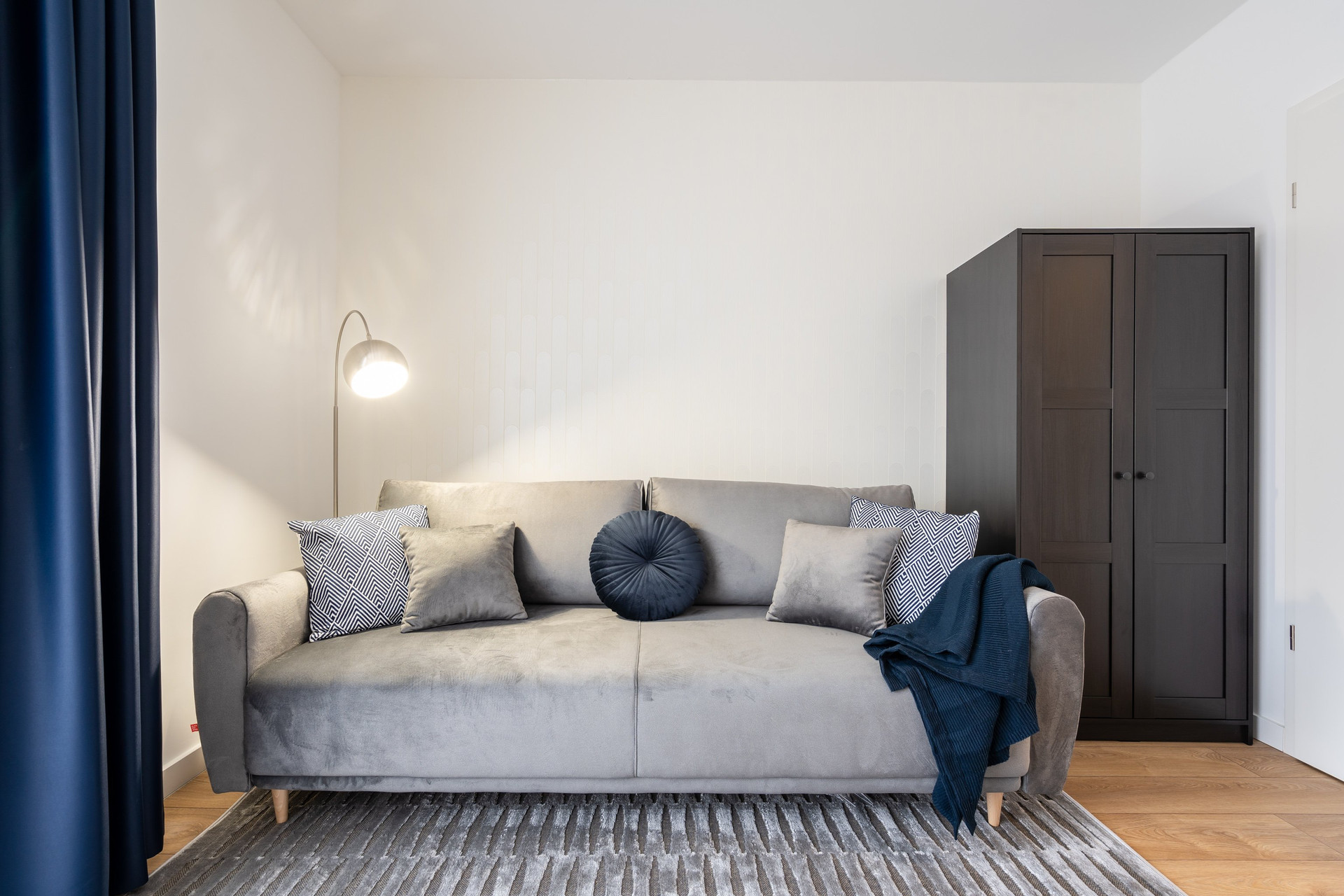 Sofa with wardrobe, living area