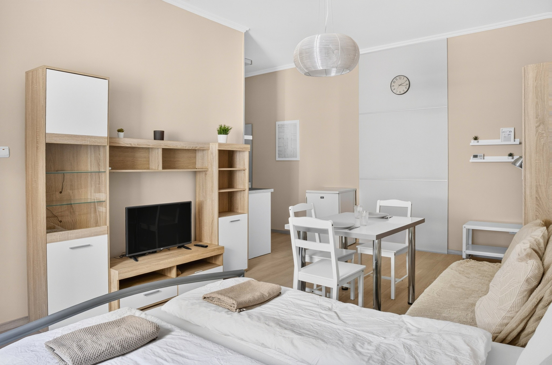 Open studio with bed dining TV