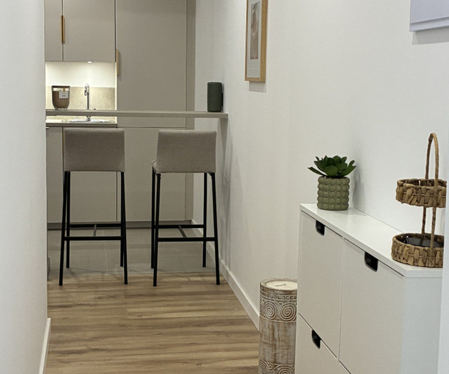 Entrance hallway leading to kitchen