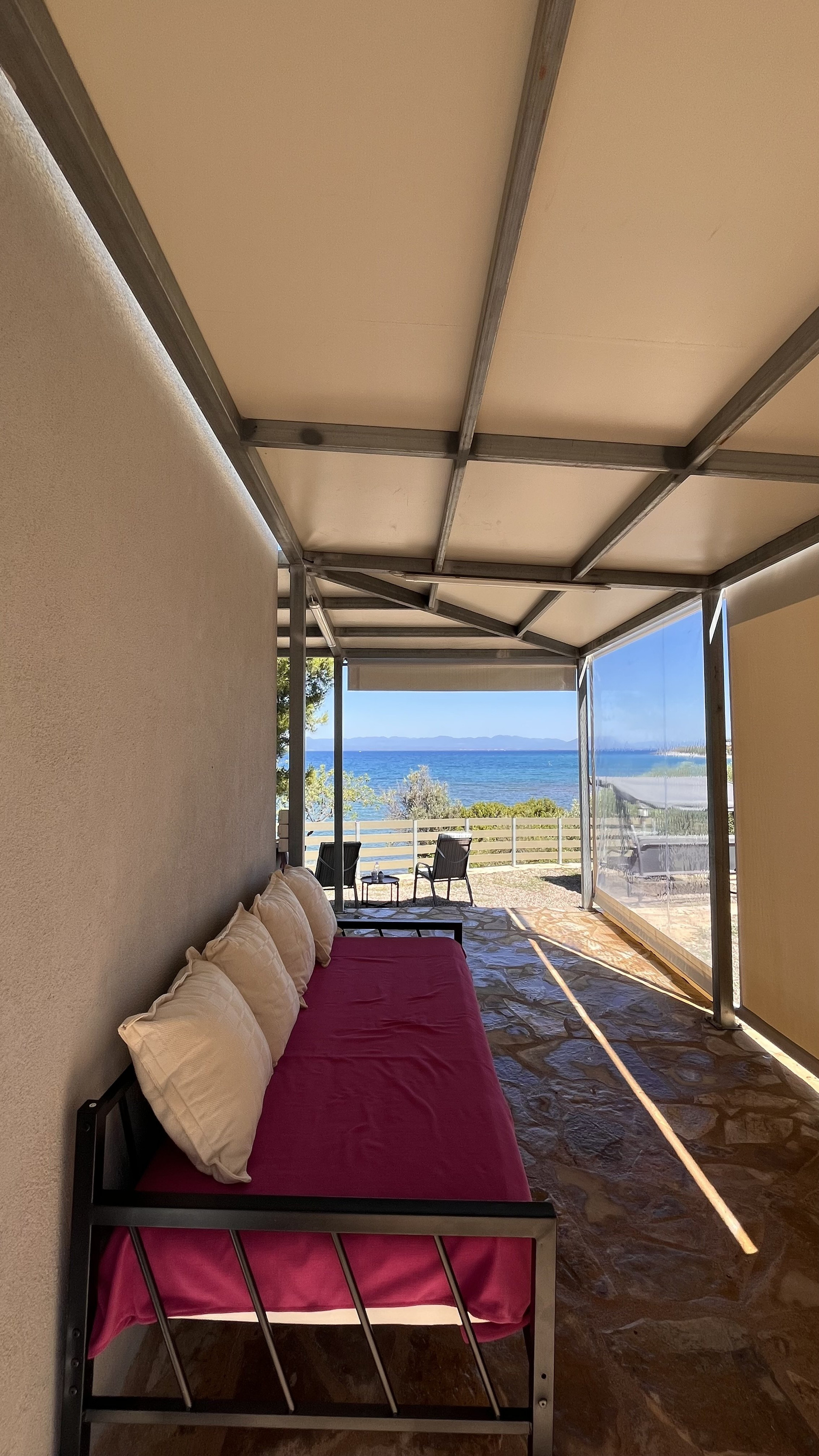 Covered terrace daybed sea view