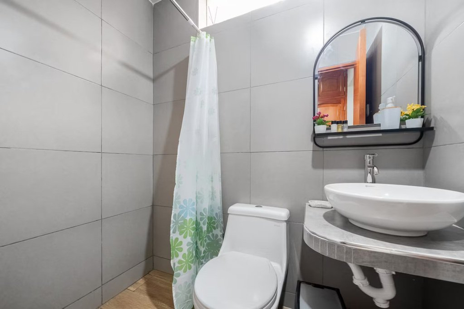 Bathroom with toilet and vanity sink