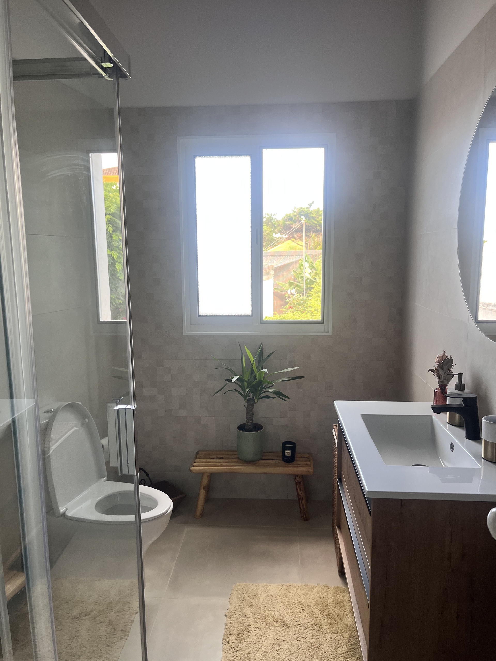 Bathroom with vanity and shower