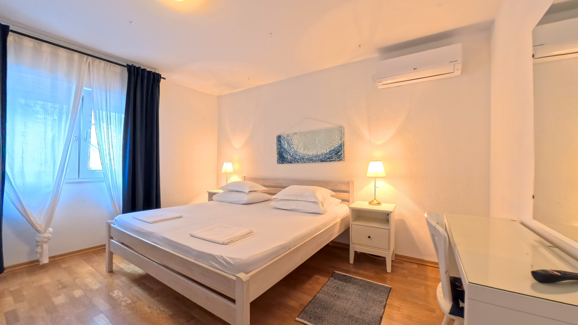 Bright double bedroom with AC