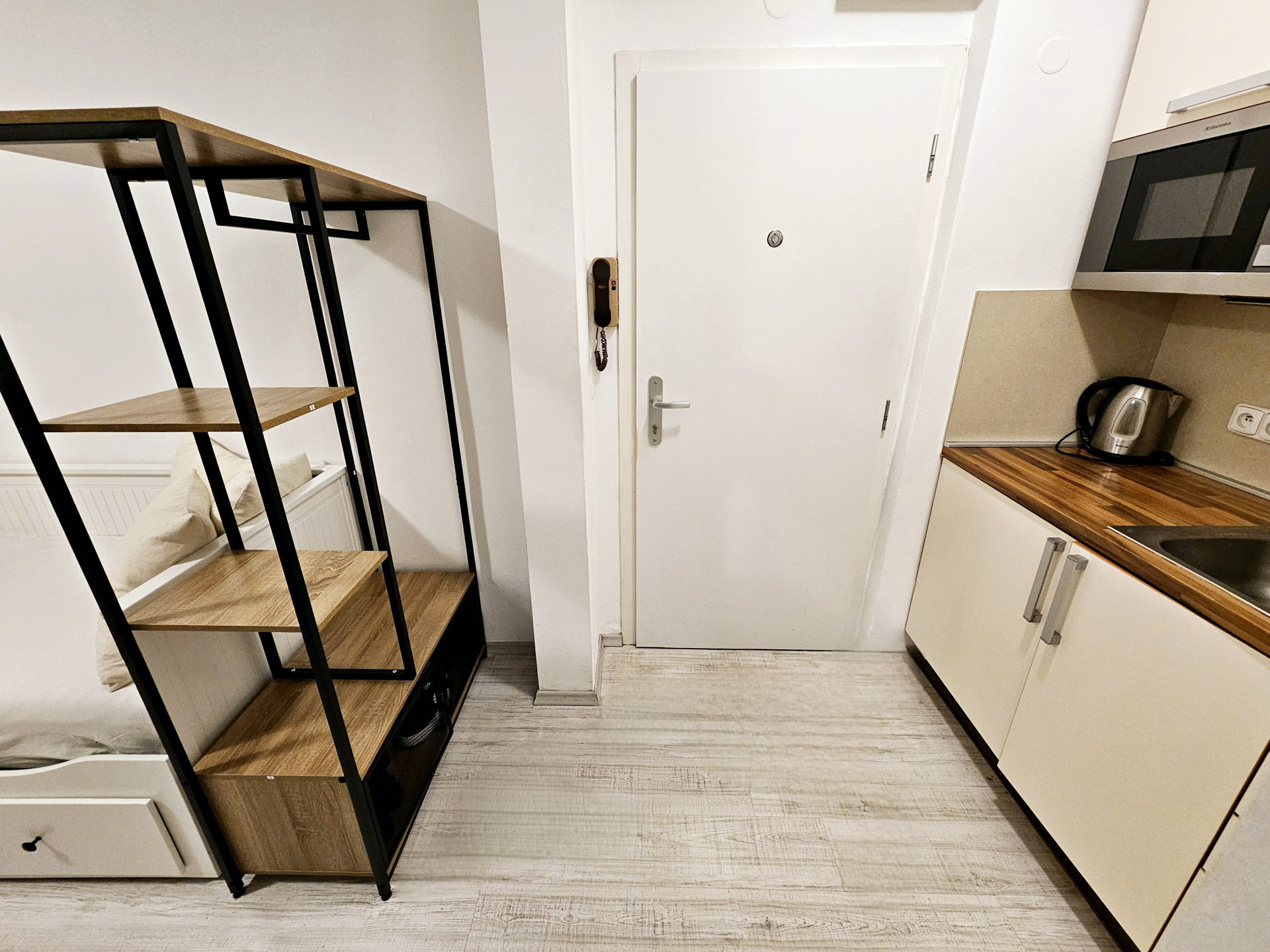 Studio entrance with kitchenette area