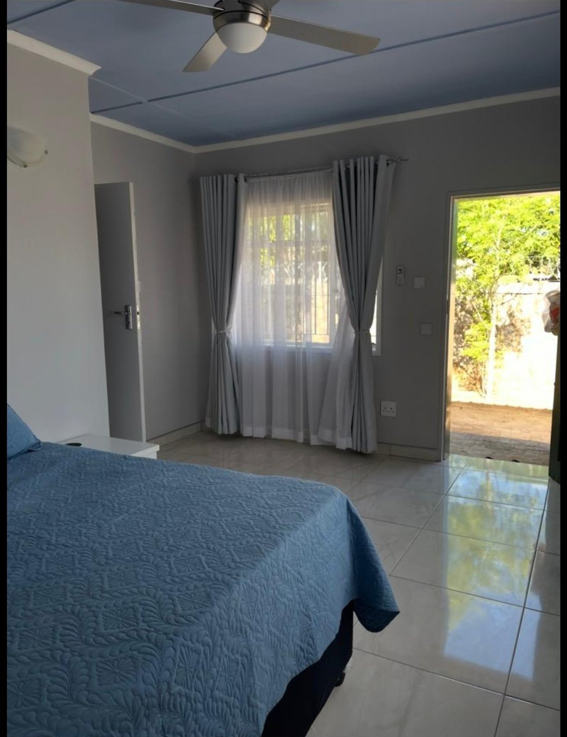 Spacious bedroom with garden access