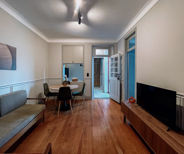 Living area with sofa and dining table