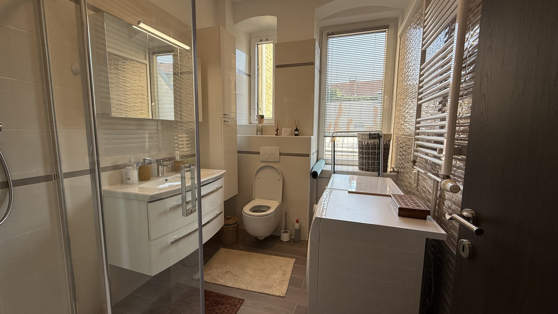 Bathroom with shower and bathtub