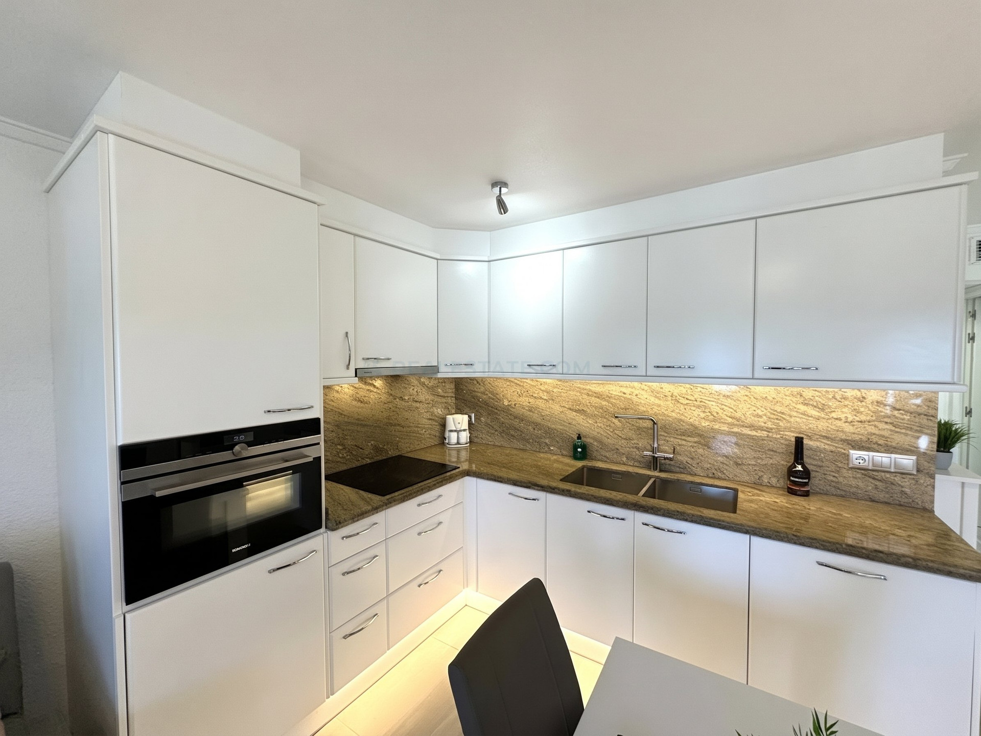 Modern kitchen with granite counters