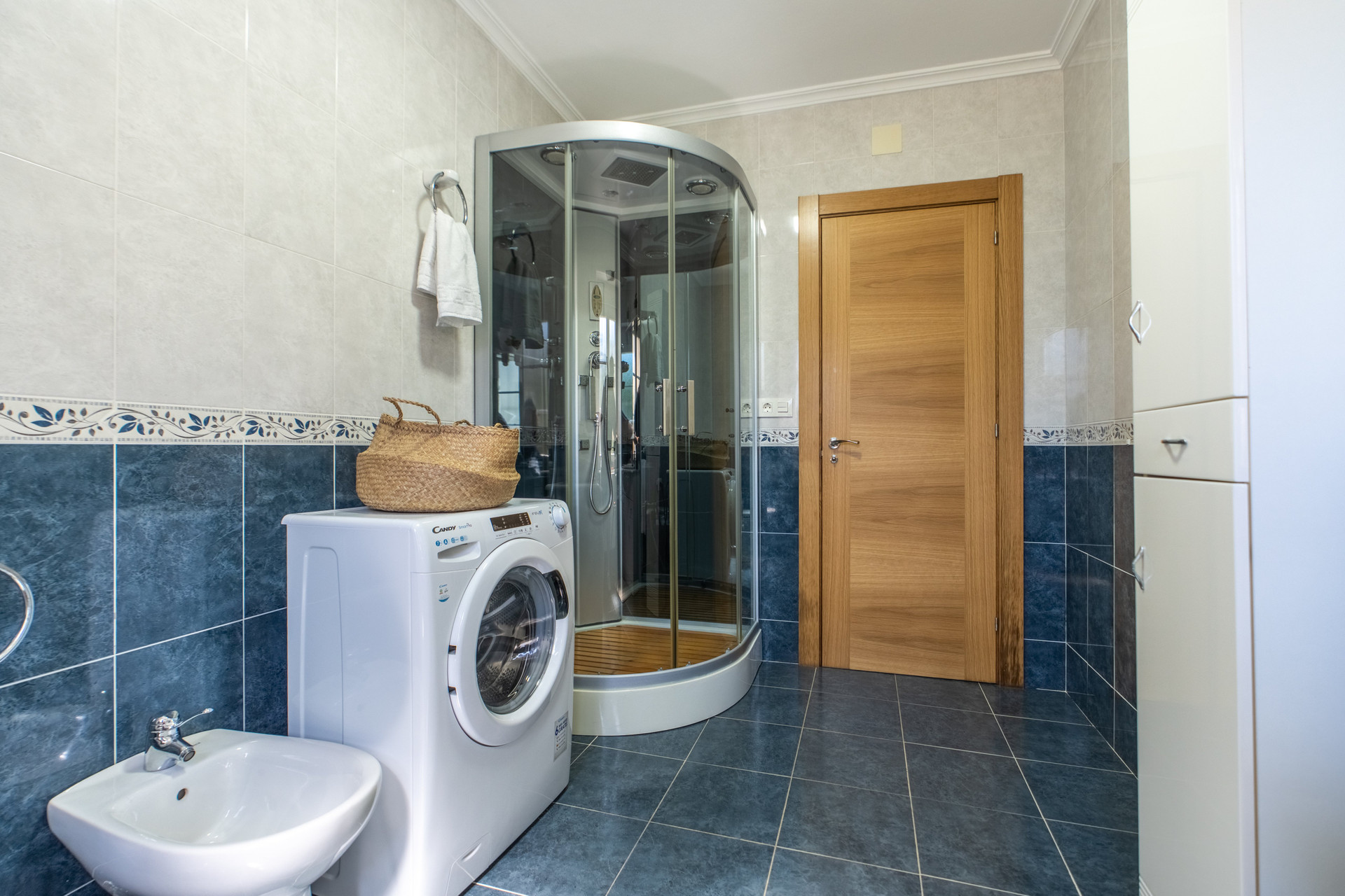 Bathroom with shower and bidet