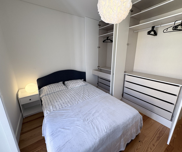 Bedroom with open closet