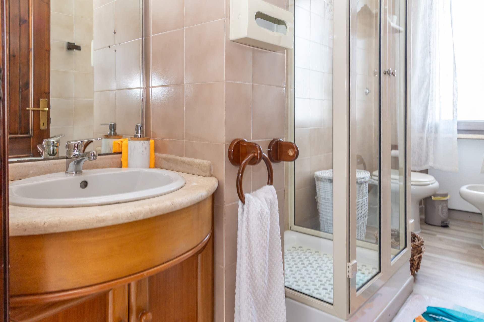 Bathroom with shower and vanity