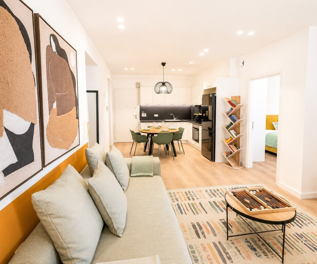 Open living, kitchen, dining area